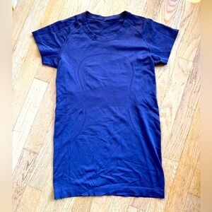 Purple swiftly tech women’s short-sleeve shirt.